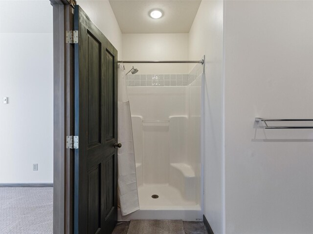 bathroom with a shower