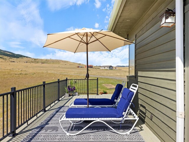 view of patio with a rural view