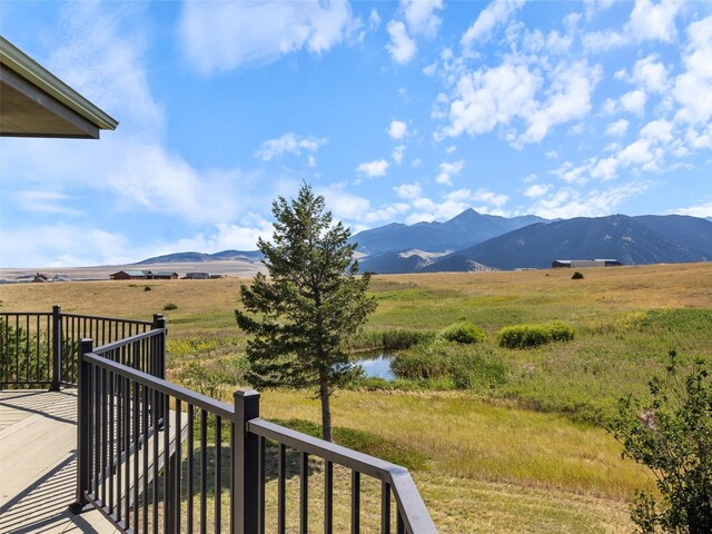 property view of mountains featuring a rural view