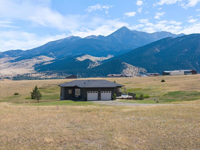 view of mountain feature with a rural view