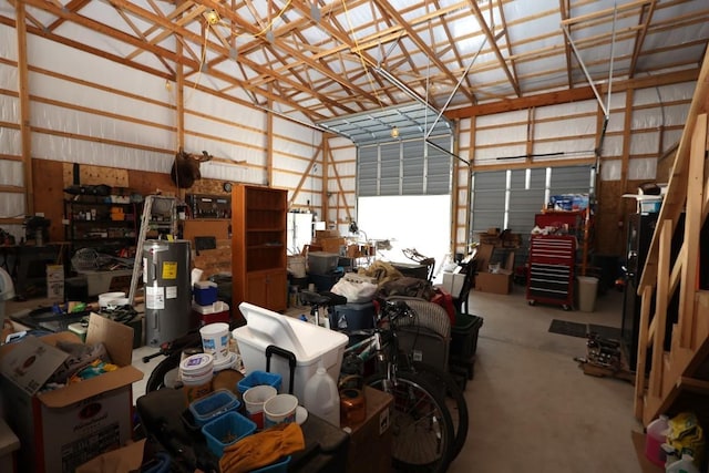 garage featuring water heater and metal wall