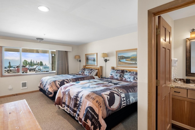 3898 Big Mountain Rd Unit 114, Whitefish, MT 59937 - bedroom with carpet and baseboards