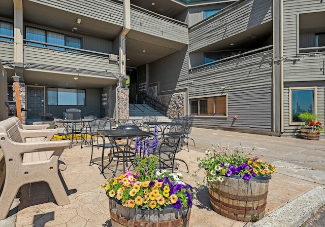 3898 Big Mountain Rd Unit 114, Whitefish, MT 59937 - view of patio featuring outdoor dining space