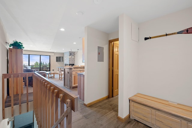 3898 Big Mountain Rd Unit 114, Whitefish, MT 59937 - hall with light wood-style flooring, recessed lighting, and electric panel
