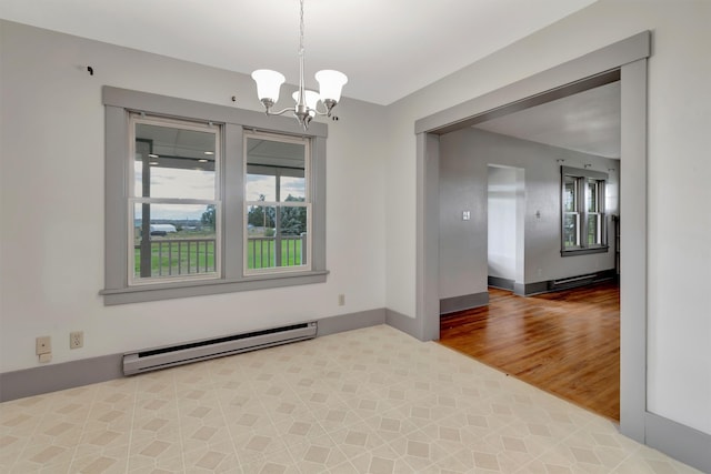 unfurnished room featuring an inviting chandelier, light hardwood / wood-style floors, and a baseboard heating unit