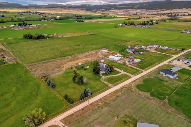 bird's eye view with a rural view and a mountain view