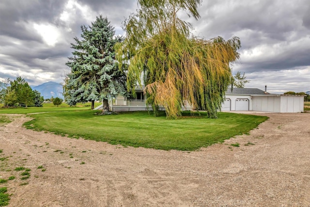 view of yard featuring a garage