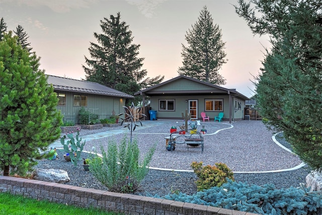 rear view of house with fence