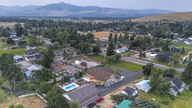 birds eye view of property with a residential view and a mountain view