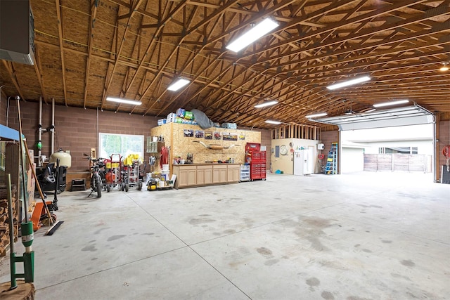 garage with a workshop area