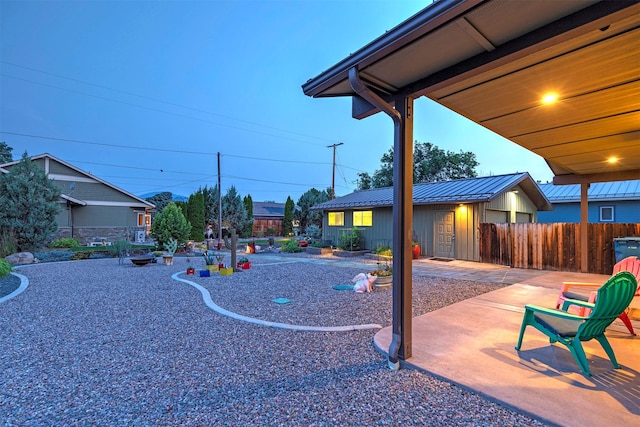 view of play area featuring a patio area and fence