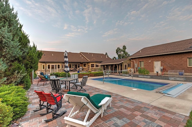 pool with a patio area