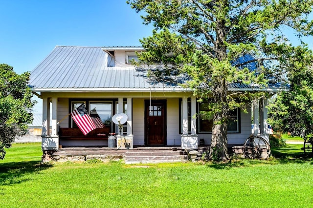 exterior space featuring a front yard and a porch