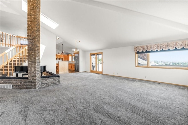 unfurnished living room with carpet floors, stairway, baseboards, and visible vents