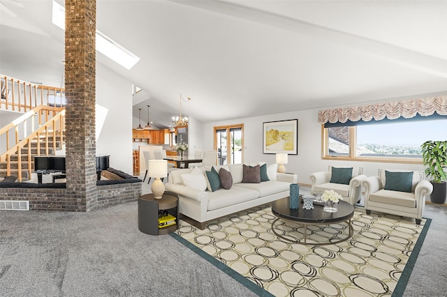 carpeted living area with an inviting chandelier, visible vents, stairway, and high vaulted ceiling