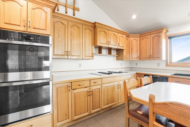 kitchen with double oven, light tile patterned flooring, vaulted ceiling, light countertops, and white electric cooktop