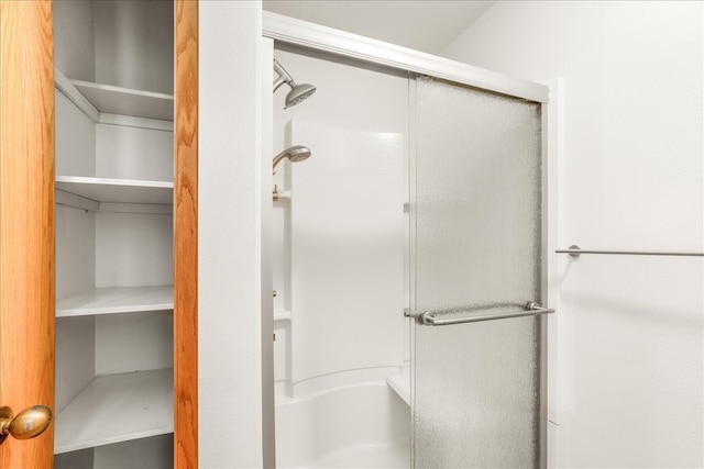 bathroom with an enclosed shower