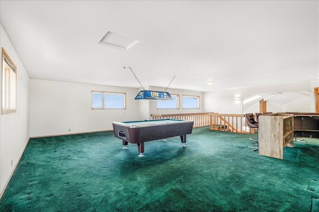 recreation room featuring attic access, baseboards, and carpet flooring