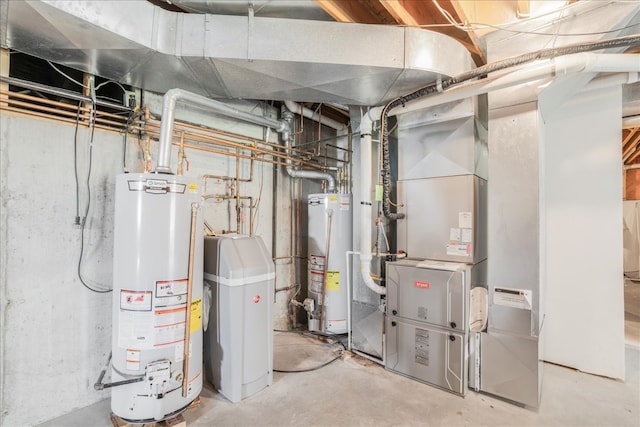 utility room featuring gas water heater