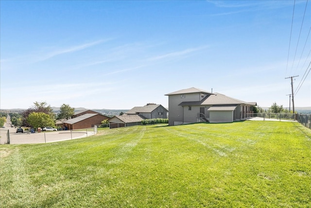 view of yard with fence