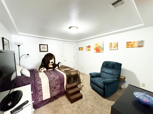 bedroom featuring visible vents and carpet floors