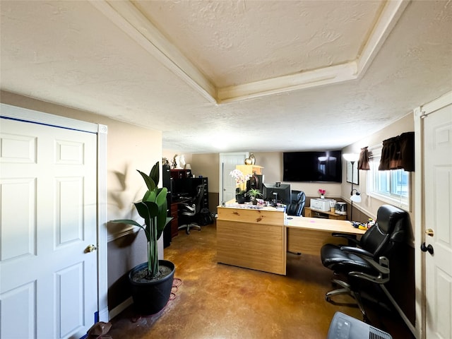 office area with a textured ceiling and concrete floors