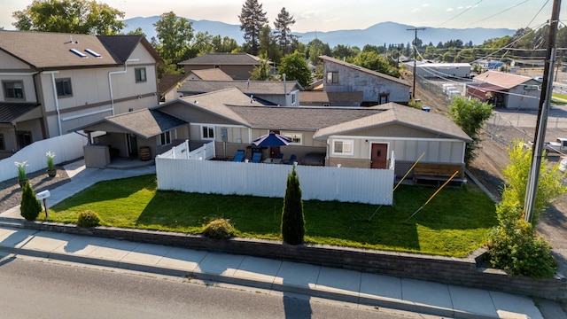 birds eye view of property featuring a mountain view and a residential view