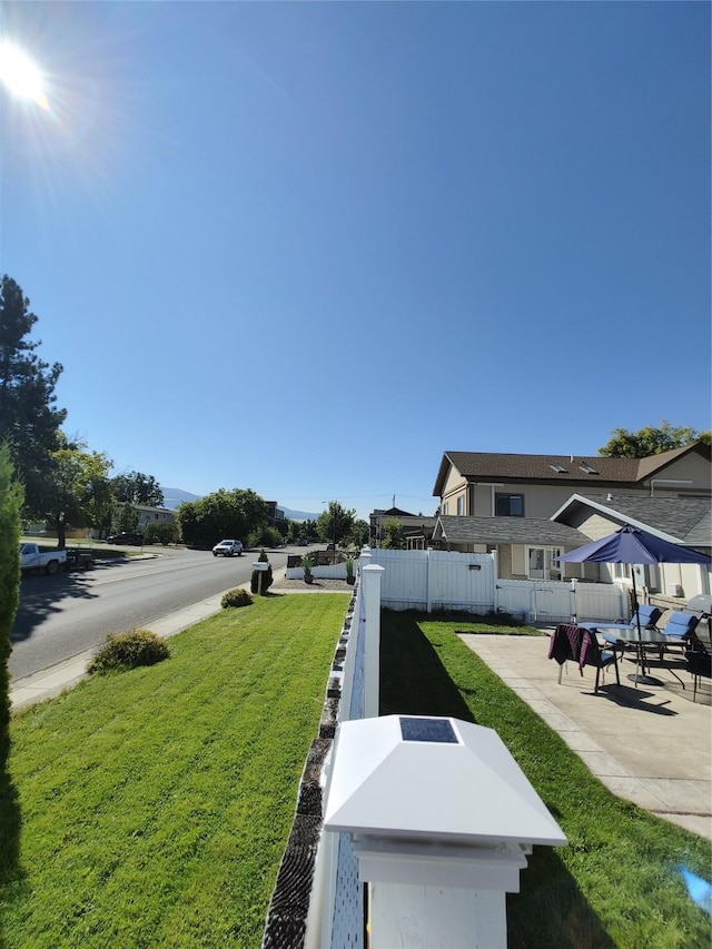 view of yard with a patio area and fence