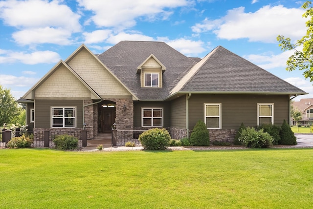 craftsman-style home with a front lawn