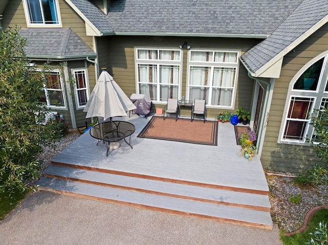 view of patio with an outdoor fire pit and a grill