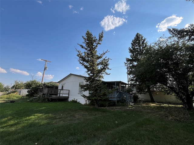 view of yard featuring a deck