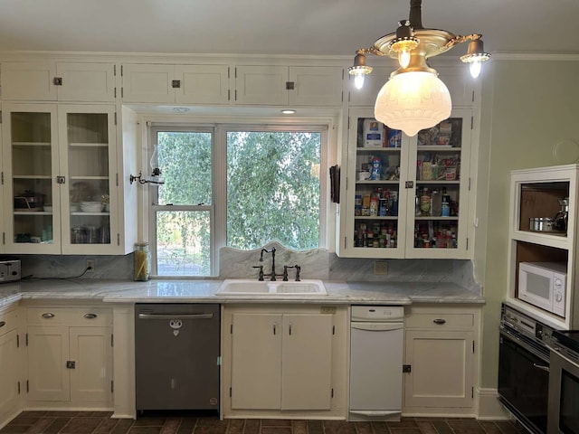 kitchen with dishwasher, white cabinetry, backsplash, and sink