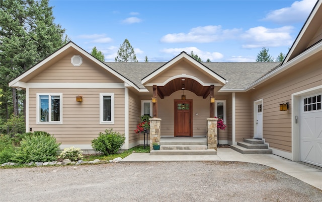 view of front of property featuring a garage