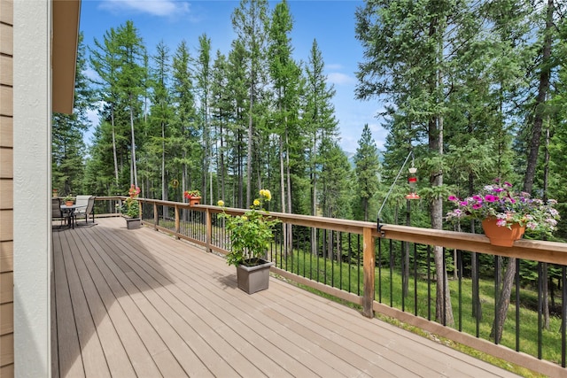 1550 Rolling Ridge Loop, Kalispell, MT 59901 - wooden terrace featuring outdoor dining space