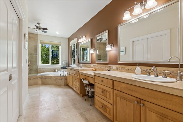 bathroom with vanity, plus walk in shower, ceiling fan, and tile patterned flooring