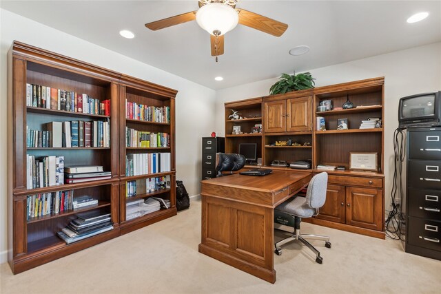 office with ceiling fan and light colored carpet