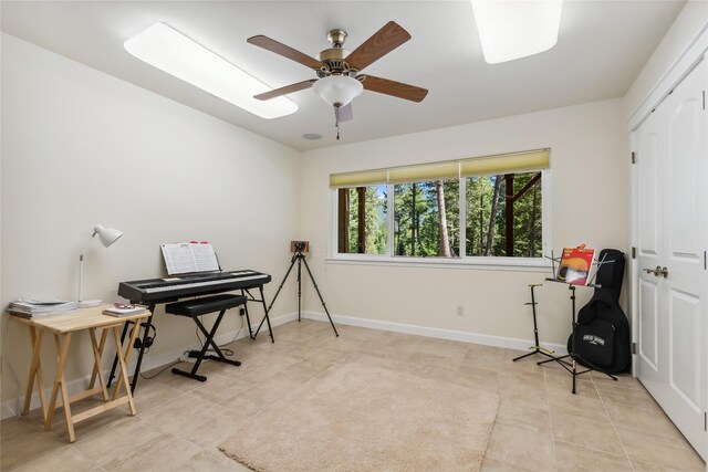 interior space featuring ceiling fan