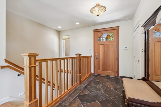 1550 Rolling Ridge Loop, Kalispell, MT 59901 - entryway featuring healthy amount of natural light, recessed lighting, and dark stone finish flooring
