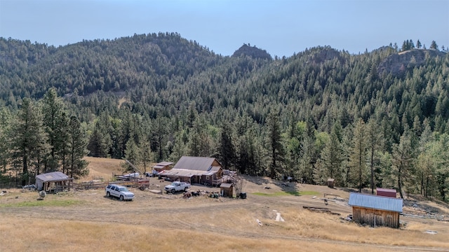 property view of mountains featuring a rural view