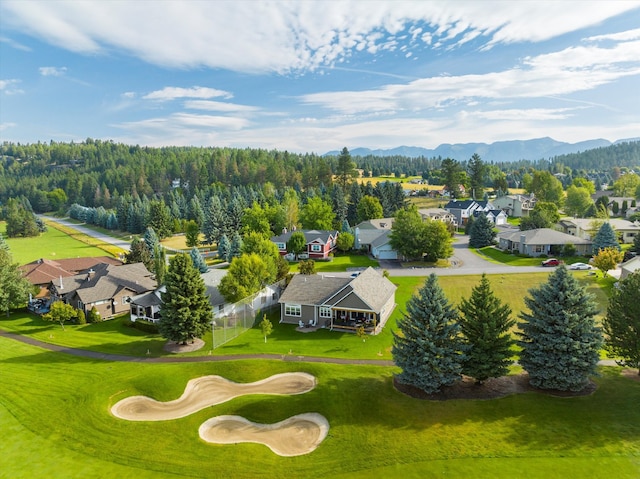 birds eye view of property with a mountain view