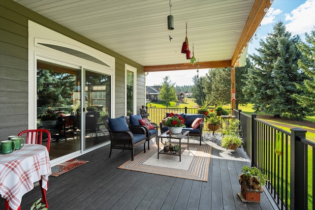 wooden deck featuring an outdoor living space