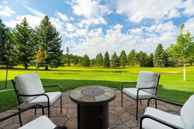 view of patio featuring an outdoor fire pit