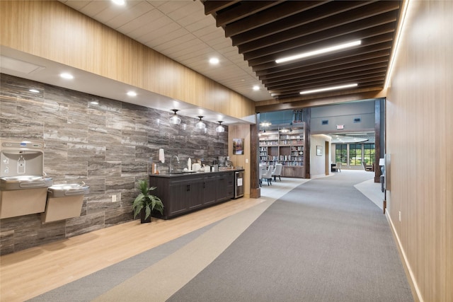 reception featuring wet bar and a sink