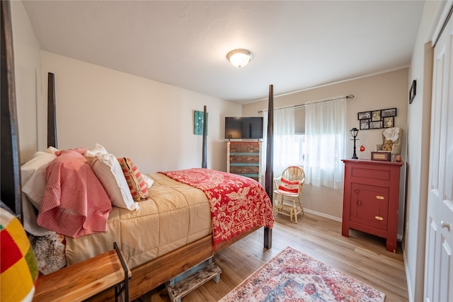 bedroom featuring light wood-type flooring