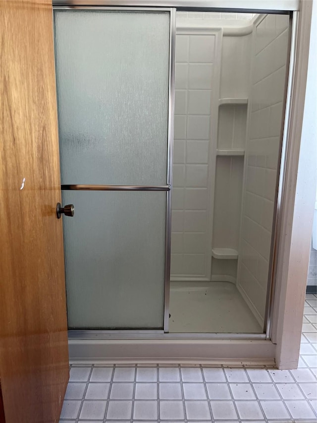 bathroom with a stall shower