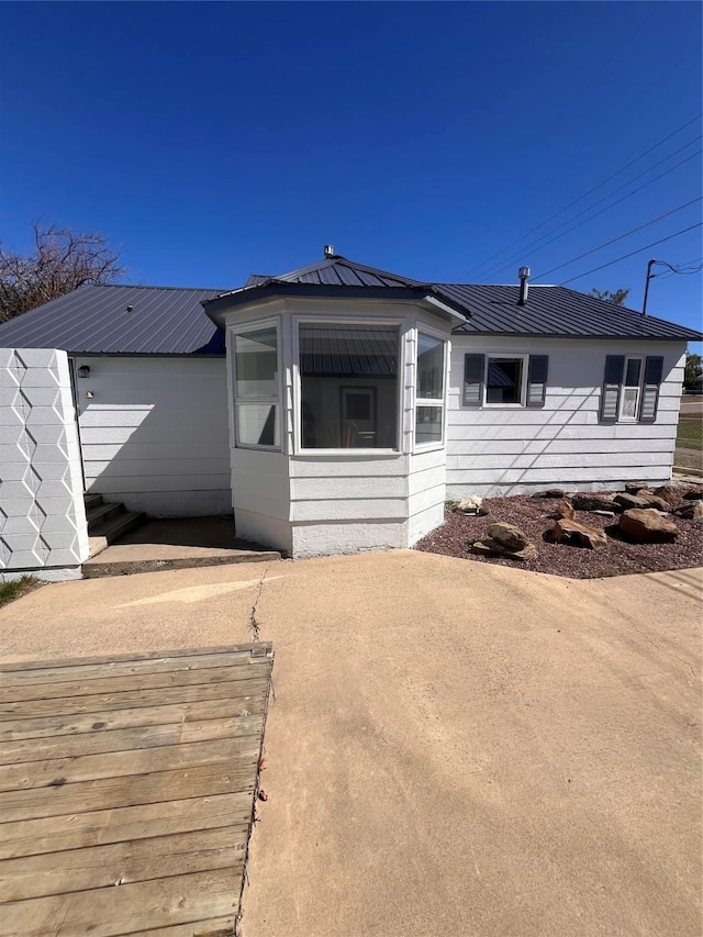 view of front of home with metal roof