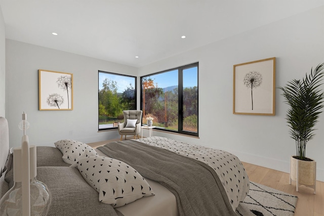 2025 Edward Ct, Missoula, MT 59804 - bedroom featuring baseboards, wood finished floors, and recessed lighting