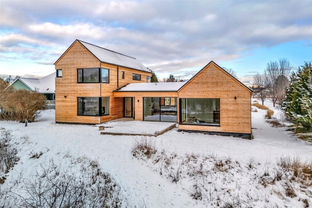 view of snow covered property