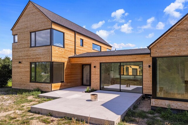 rear view of house featuring a patio area