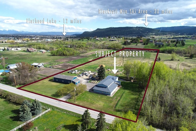 overview of rural landscape featuring property boundaries highlighted and mountains